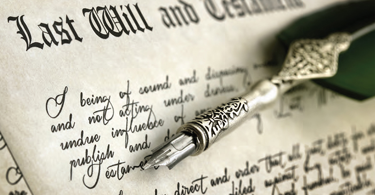 Close-up of a “Last Will and Testament” document with a fountain pen